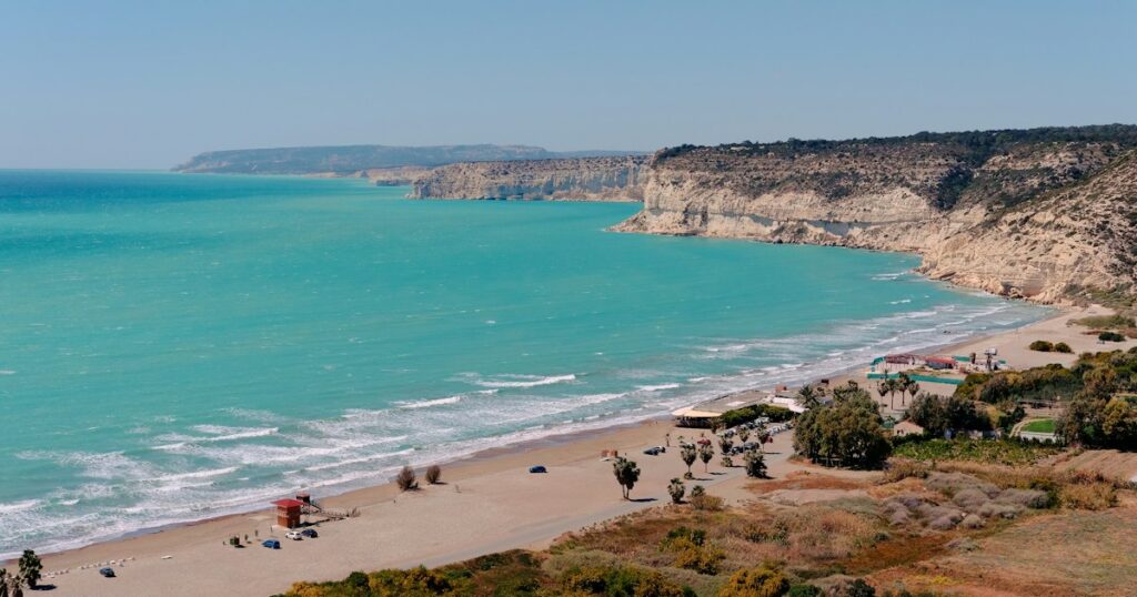 Turquoise sea and sandy beach — Cyprus Golden Visa for Americans guide